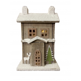 Maison en bois éclairée