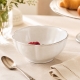 Impressions blanc 13 cm mis en ambiance sur une table élégante.