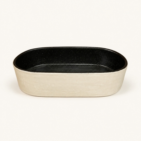 Petit plat ovale profond Nótos noir et crème en grès fin – Costa Nova