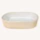 Petit plat ovale Nótos crème en grès fin, 18,6 cm, présenté seul sur fond clair.