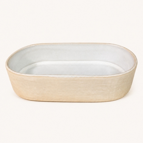 Petit plat ovale Nótos crème en grès fin, 18,6 cm, présenté seul sur fond clair.