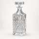 Carafe Cristel en verre travaillé avec bouchon — hauteur 28 cm.