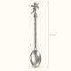 Petite cuillère argentée Anges, longueur totale de 12 cm.