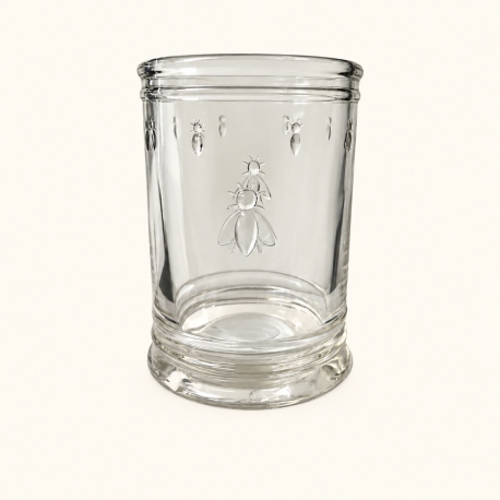  Pot à ustensiles Abeille La Rochère en verre transparent à motifs en relief sur fond ivoire clair.